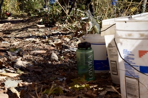 Loyola Bottle and Buckets at Stream